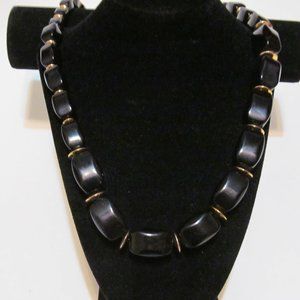 Long Napier black bead and gold tone tab necklace signed